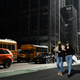 People walk down 6th Ave in Manhattan during unseasonably warm weather on November 2, 2022.